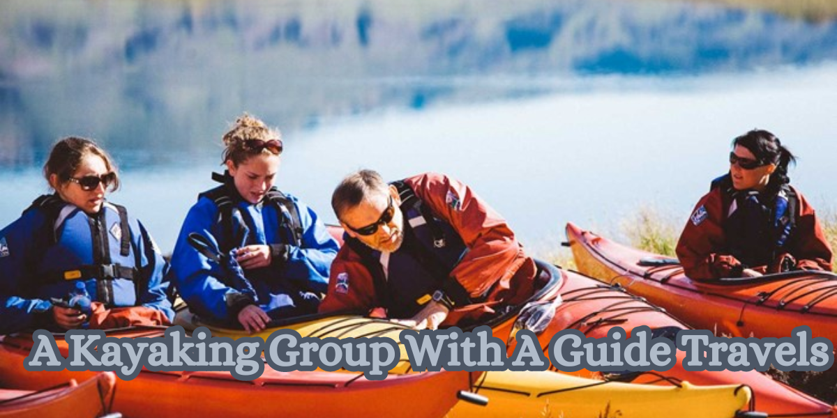 A Kayaking Group With A Guide Travels